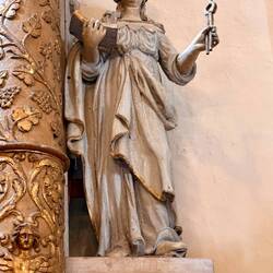 Angel with a book and a key to heaven