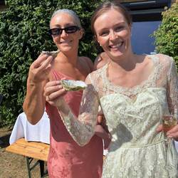 Olive and Emily checking out the oysters
