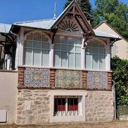 A delightful house with 'story book' windows near the entrance to the Fontainebleau forest