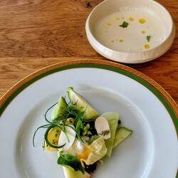 Entree of Ajo blanco, cold almond soup and a stunning salad