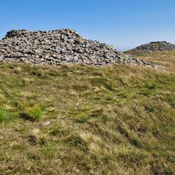 Pair of piles of stones atop Pen Pumlumon Arwystli