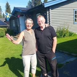 Elizabeth and Leif in front of Elizabeth's house