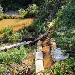Water being channelled. By the look of the colour of the channels the water is not good