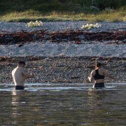 The locals enjoy an evening bath in the 6°C water.