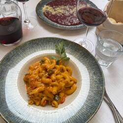 "Maccheroni" with vegetables and Gorgonzola and a risotto made with wine and cheese. Delicious!