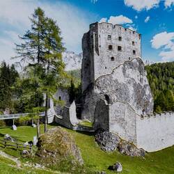 Slightly 3D sign for Castello di Andraz delineates the erratic boulder on which the castle was built