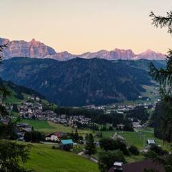 Sunset view from our balcony at Chalet Cogolara — Colfosco, Italy.