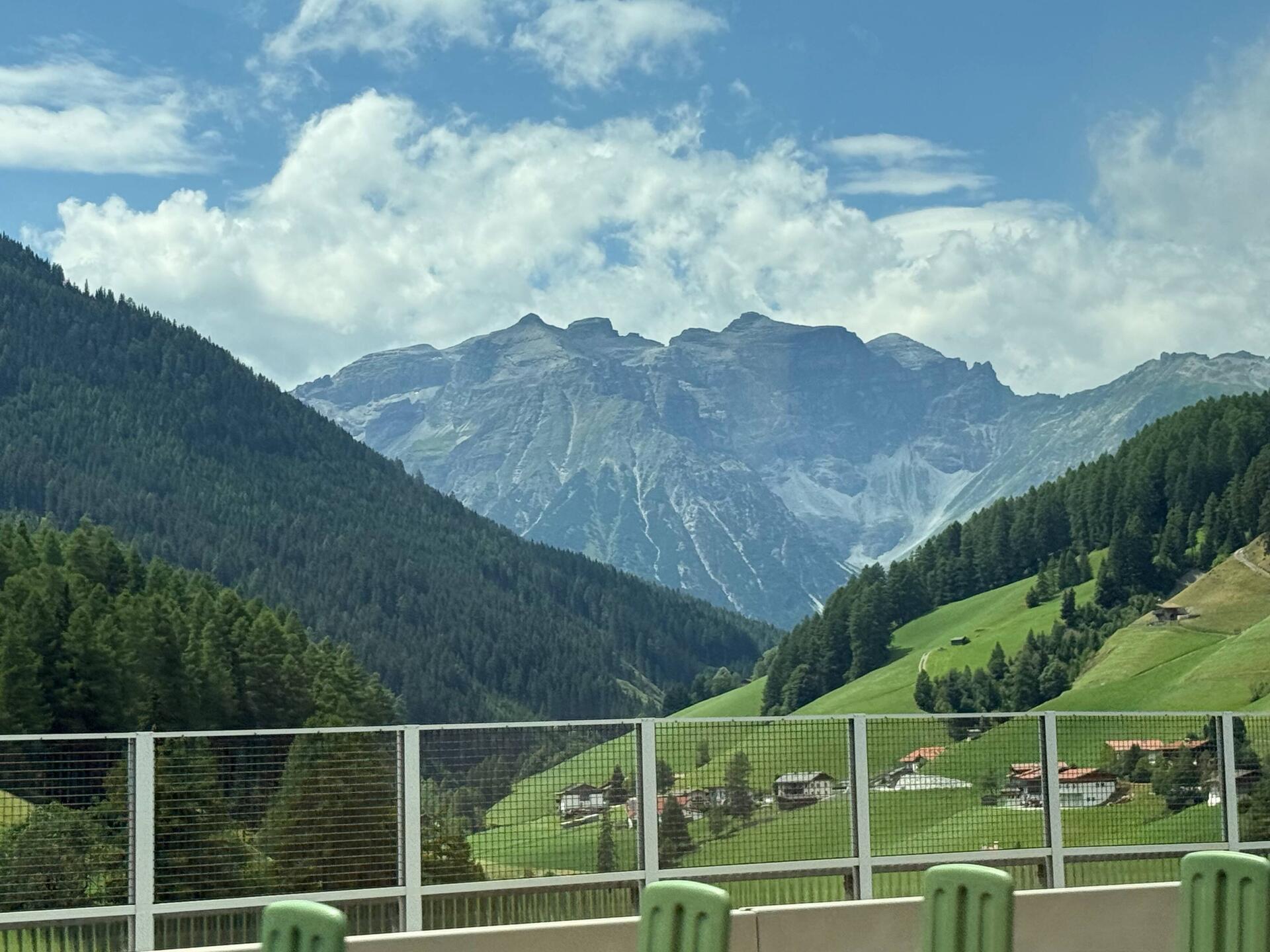 Bus window shot of the Alps.