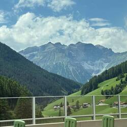 Bus window shot of the Alps.