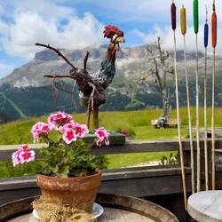Eclectic decorations on the deck of the 'Refuge of the Owls' — Pralongià Plateau, Dolomiti.