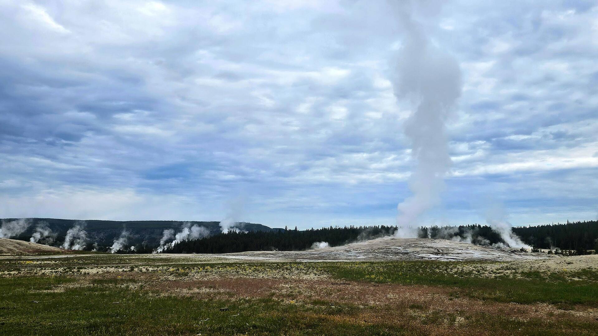 Geyser basin near Old Faithful. Cold morning, so plenty of steam.