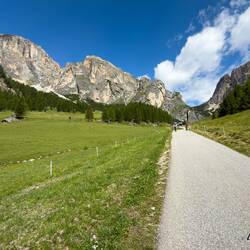Looking back from the paved trail as we head down to town — Colfosco, Italy.