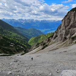 Suzanne climing up the steep scree
