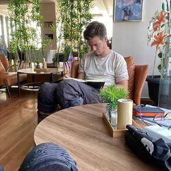 Unusual: dirty and sweaty, a break at a fancy cafe.