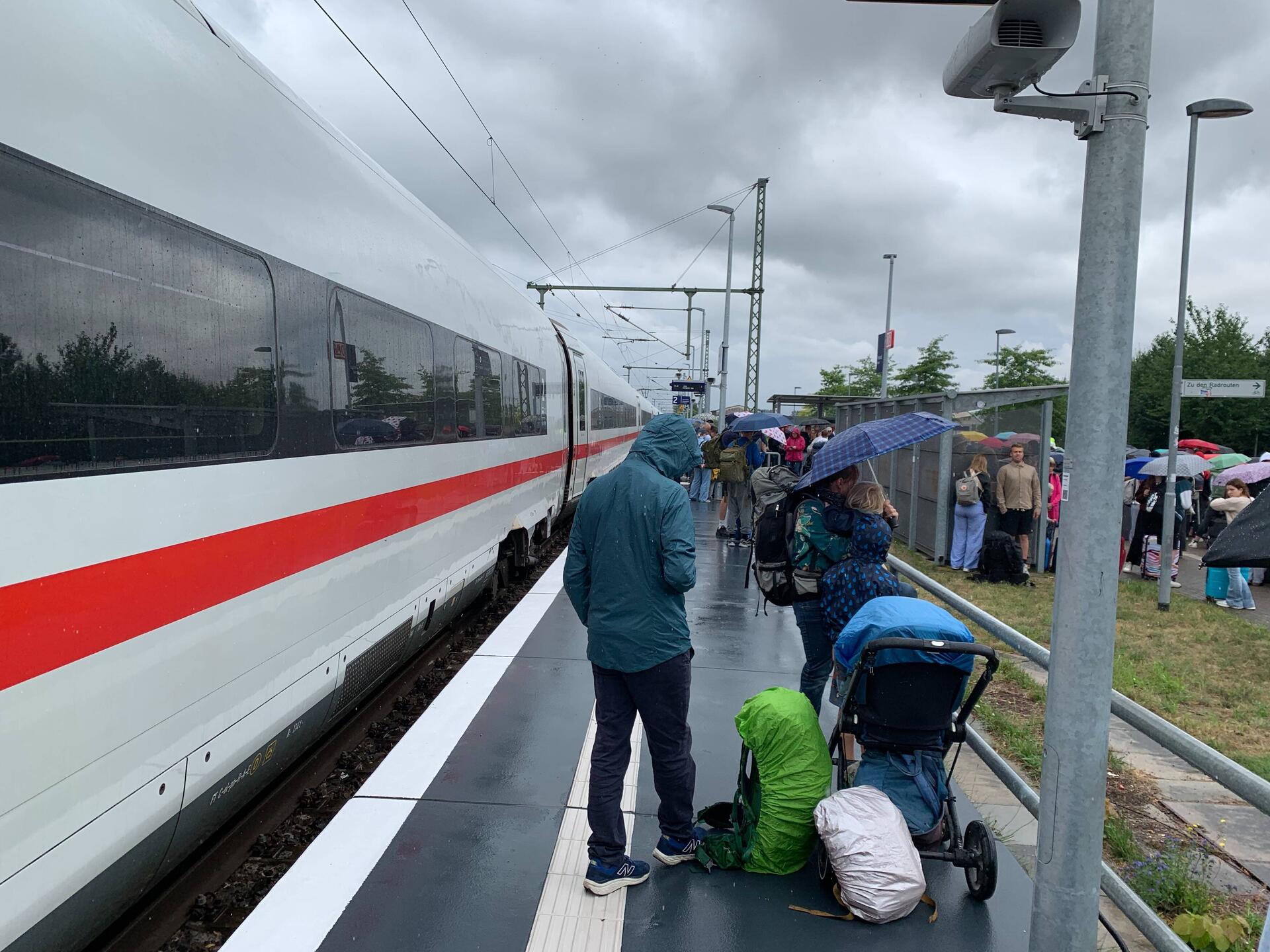 Our broken down train, and fellow damp passengers