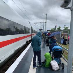 Our broken down train, and fellow damp passengers