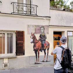 Our guide, Philippe and some different street art