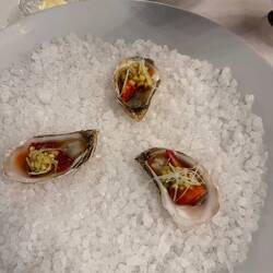 Nova Scotia oyster with kimchi, strawberry, cucumber