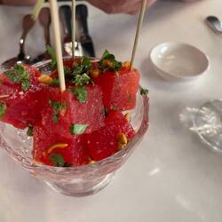 Watermelon with herbs and vinaigrette