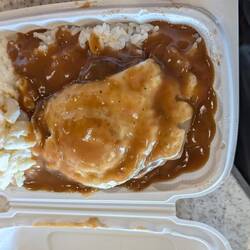 Enjoying some local cuisine, this is a Loco Moco, Egg, steak, rice, gravy, noodle salad. Yummy