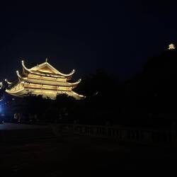 The top temple, and Jade Pagoda lit up at night.