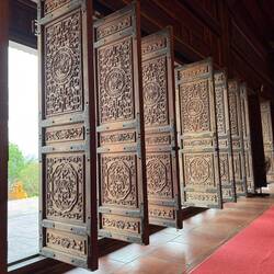 I loved taking my shoes off, stepping through the series of huge wooden doors...