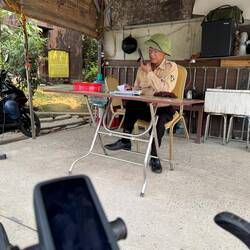 This official was quite bemused as to what to do with us. He radioed the hotel for verification.