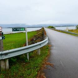 A rather long straight road across to the island