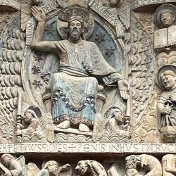 Detail. Christ enthroned at Tympanum's center. The elect are to his right