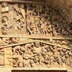 On bottom right, Satan presides over the damned tortured in hell