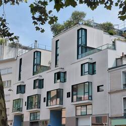 Contrasting modern townhouses on the block next door