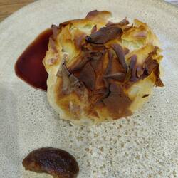 Guineafowl wrapped, beef wellington style with cabbage and foie gras