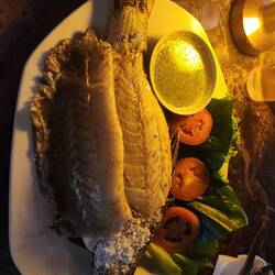 This fish was gigantic!! All the side sauces were too spicy for me until they offered a kids sauce