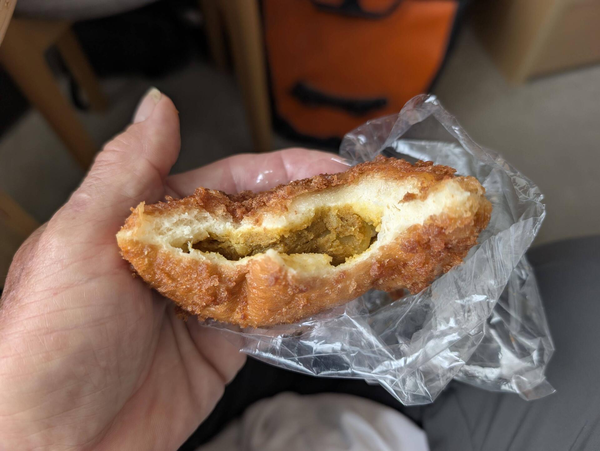Curry bread, like a curry filled donut.