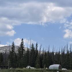 We are just below where the trees stop growing due to elevation. Still a patch of snow or two.