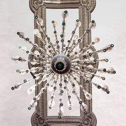 Looking up into a crystal chandelier and ceiling medallion — Palazzo Barberini.