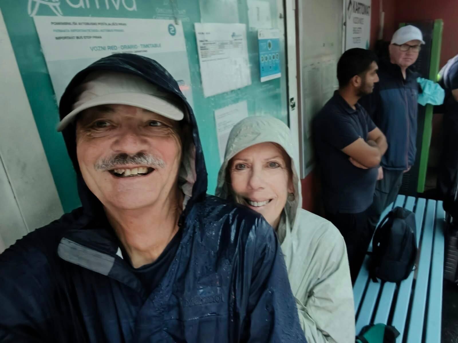 Drenched, waiting for the bus.
