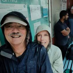 Drenched, waiting for the bus.