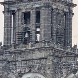 Person in Bell Tower ringing the bells