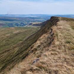 Fan Hir ridge. Note the smoke from a fire in the Vale of Glamorgan. Looks like it is on the coast?