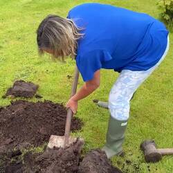 Barbara filling in the hole wot Steve dug