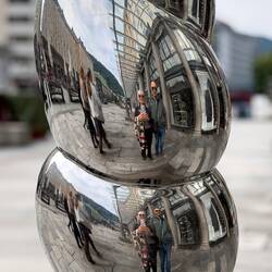 Having fun with a decorative column @ Torgallmenningen, the city's main square — Bergen, Norway.