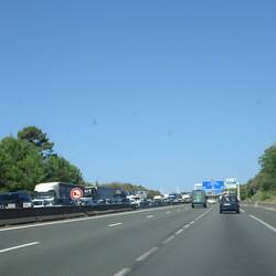 Kilometers file de andere kant op.