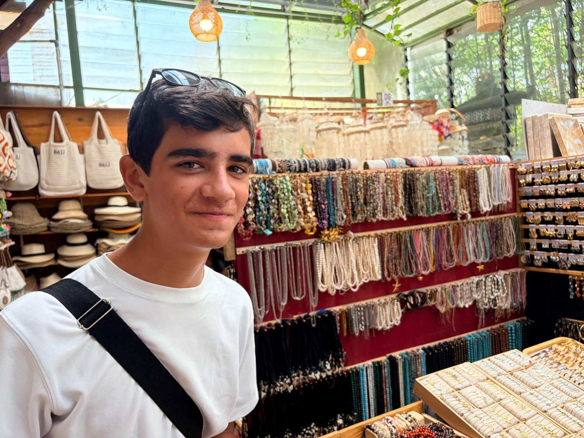 Eashan at a local market . He seemed to enjoy bargaining !
