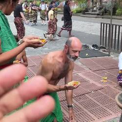 Adults put the offering on the table while kids put the offering on the floor for balance