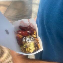 Warm bread pudding like with plums and raisins