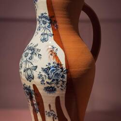 "Jug" (Lippa Dalén; 2004); earthenware, white slip, decals ... Kode Art Lysverket.