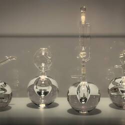 "Glass Laboratory #4-7" (C. Maske; 2023); blown glass joined with discarded laboratory glassware.