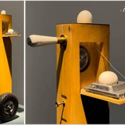 "Serving Device for Egg" (S. Bronger; 2001); wood, egg slicer; glazed porcelain; rubber tyres, metal