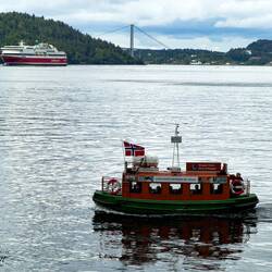 Bergen harbor tour and one of the ferries that ply these waters ... Nordnes — Bergen, Norway.